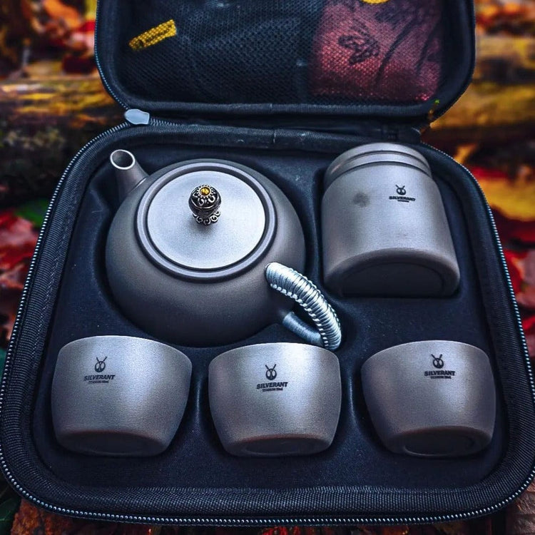 
                  
                    SilverAnt Ultralight Titanium Teapot & Traditional Tea Set - actual product photo, opened tea case showing tea pot, container, and double wall cups
                  
                