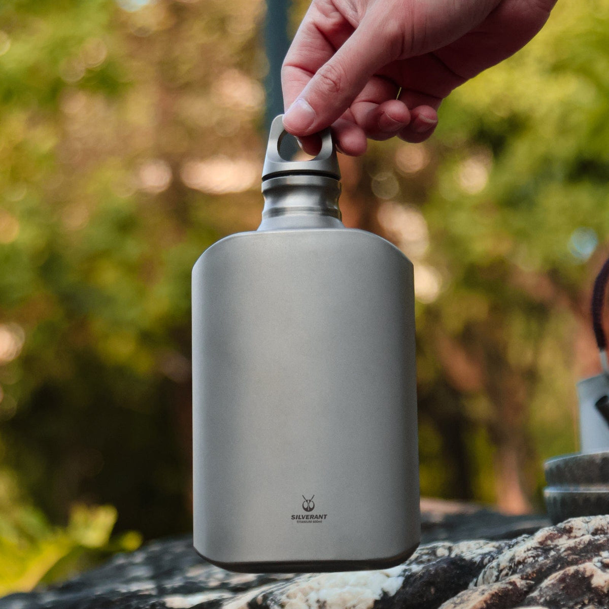 SilverAnt Ultralight Titanium Water Bottle 600ml/21 fl oz Slim - Sandblasted (In-use, Actual product photo, lifestyle shot)