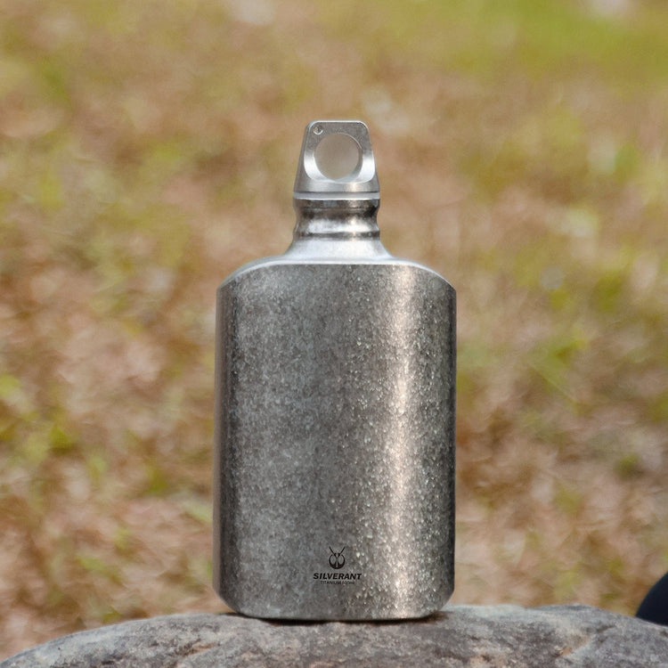 
                  
                    SilverAnt Ultralight Titanium Water Bottle 600ml/21 fl oz Slim - Crystallized (actual product photo, lifestyle shot, placed on a rock)
                  
                