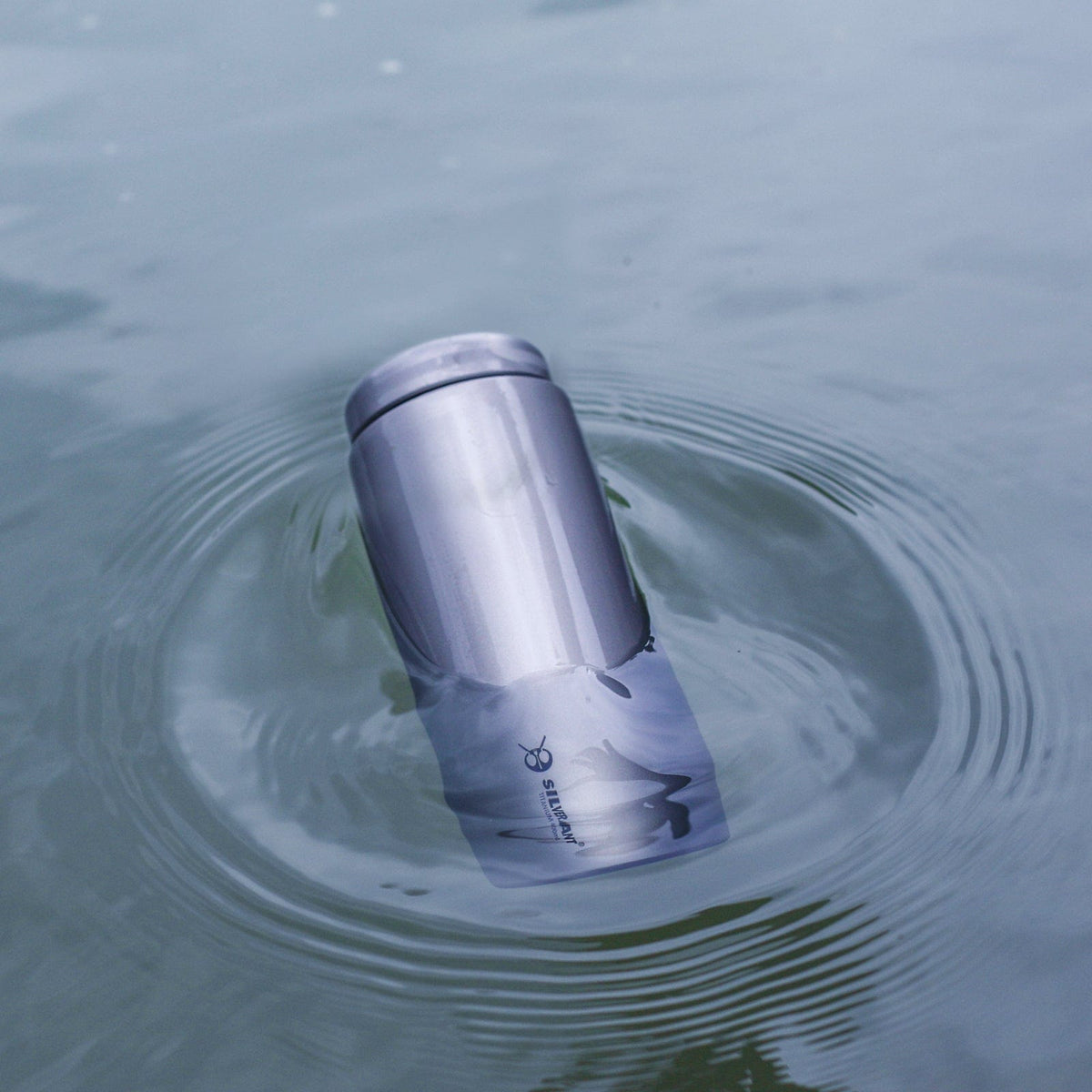 SilverAnt Ultralight Titanium Water Bottle Wide Mouth Screw Top - actual product photo, floating in the water