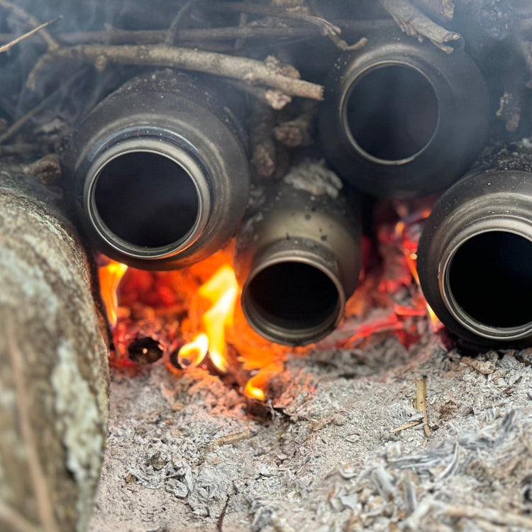 
                  
                    SilverAnt X 5Athlon Nomads Trails Collaboration - SilverAnt Large Titanium Water Bottle with Cup boiling water directly on fire/coal
                  
                