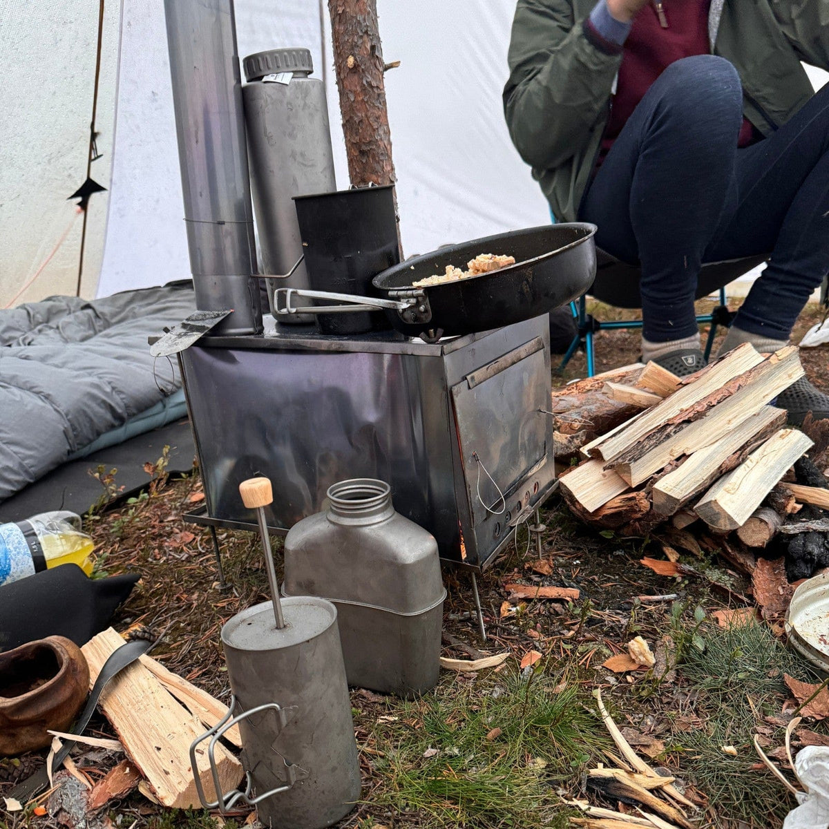 SilverAnt X 5Athlon Nomads Trails Collaboration - Cooking in the tent wood stove with various SilverAnt gear
