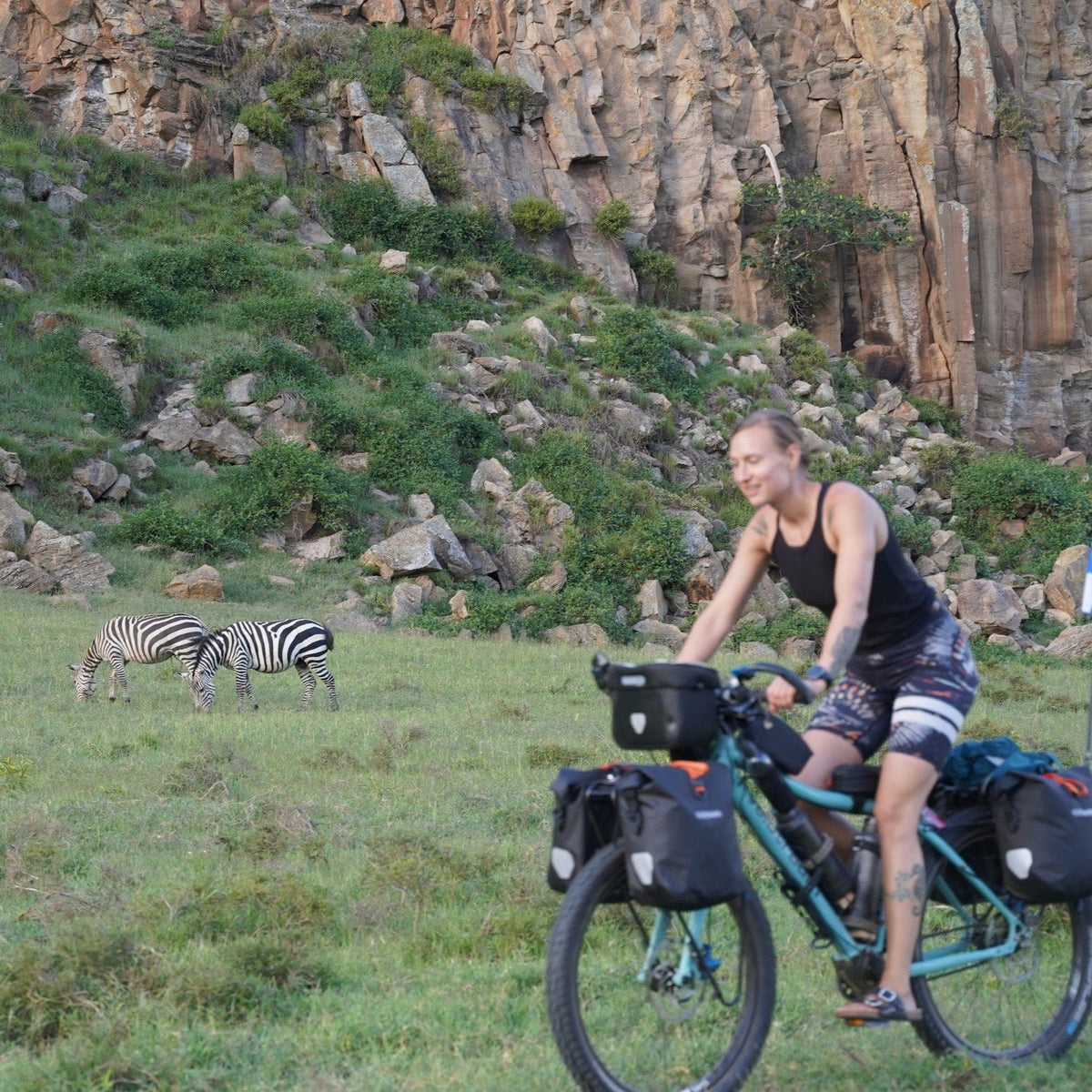 SilverAnt X 5Athlon Nomads Trails Collaboration - Sailor lifestyle shot, with zebras in the background, bikepacking