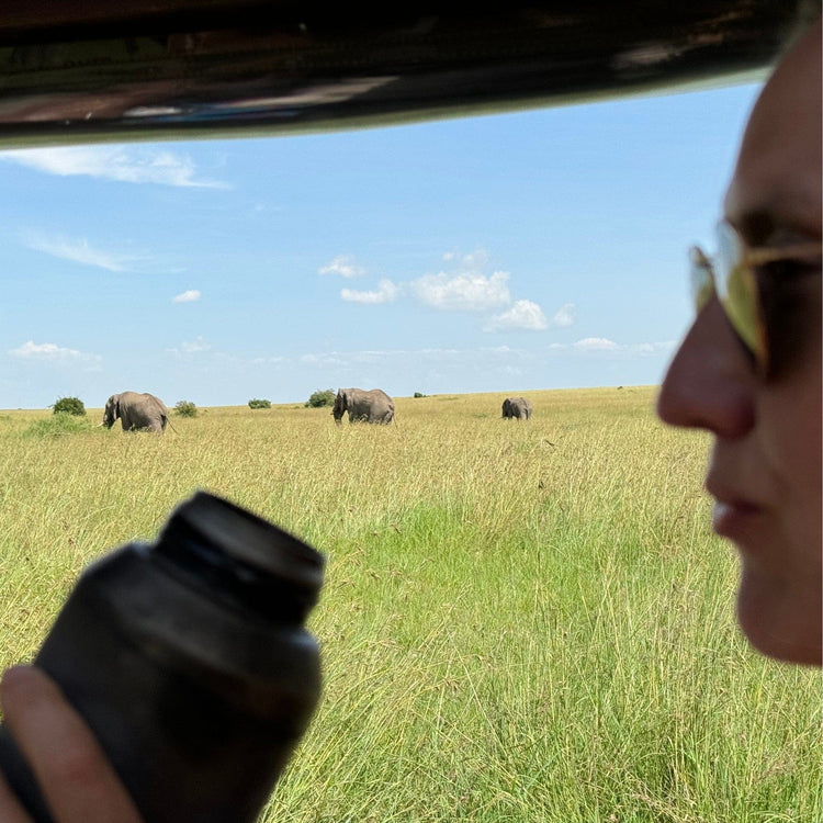 
                  
                    SilverAnt X 5Athlon Nomads Trails Collaboration - Sailor drinking from SilverAnt water bottle on the foreground with elephants in the background afar
                  
                