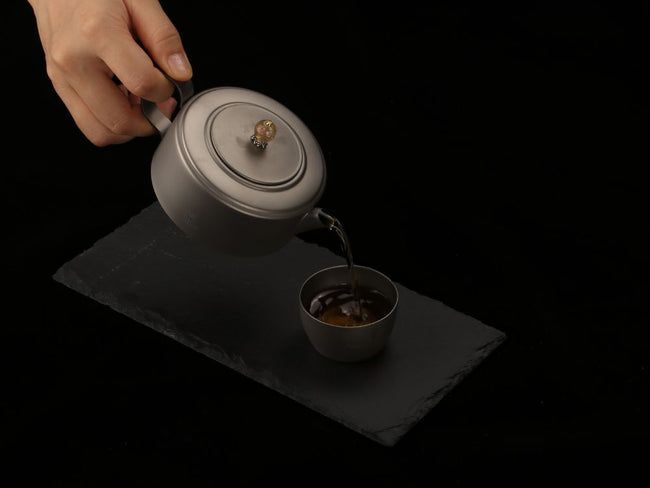 titanium tea kettle and cups