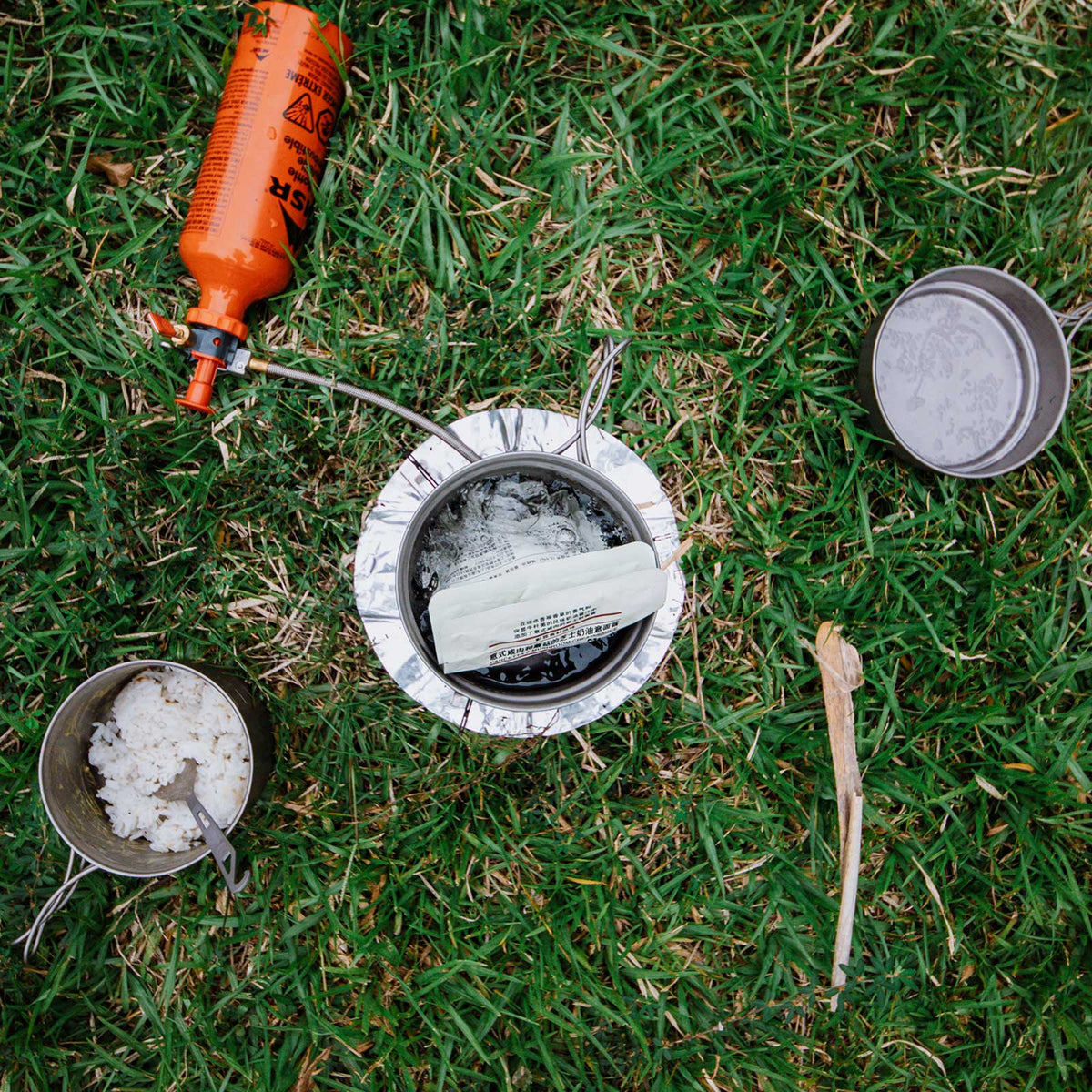 SilverAnt Ultralight Titanium 3-Piece Camping Cookware Set - In-Use (Top view, grass, rice, lunch, camp meal)