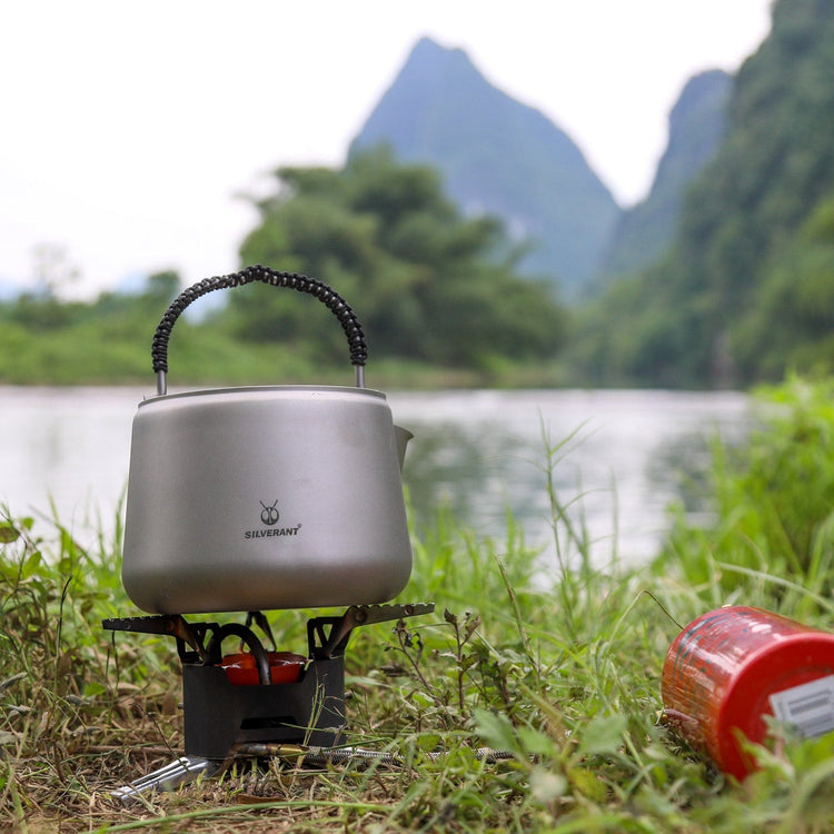 
                  
                    SilverAnt Ultralight Large Titanium Kettle 1400ml/49 fl oz - In-Use (River, grass, kettle, titanium)
                  
                