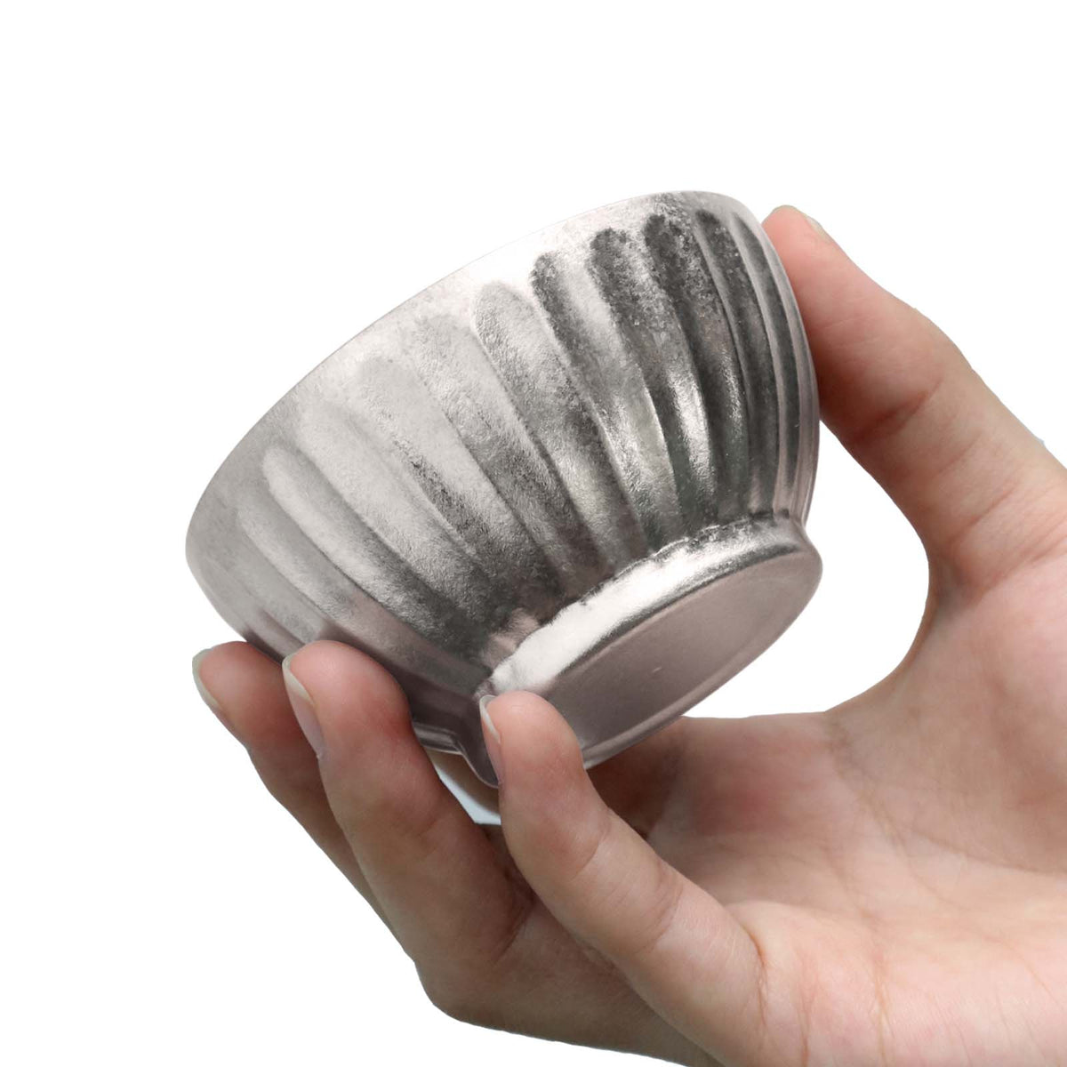 SilverAnt Ultralight Titanium Double-Wall Tea Cup 80ml/2.7fl oz (on hand, close-up of finish)