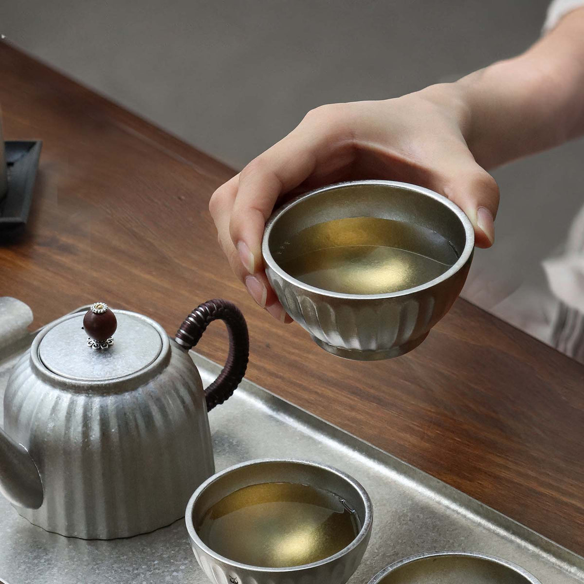 SilverAnt Ultralight Titanium Double-Wall Tea Cup 80ml/2.7fl oz (actual product photo, in-use, drinking tea)