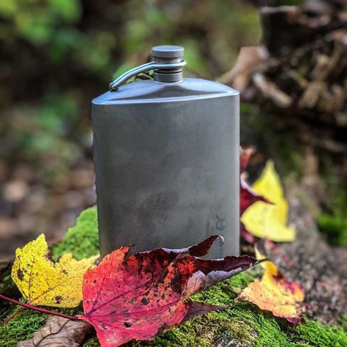 SilverAnt Ultralight Titanium Hip Flask With Funnel 220ml/7.74 fl oz Sandblasted - Actual product photo, lifestyle shot