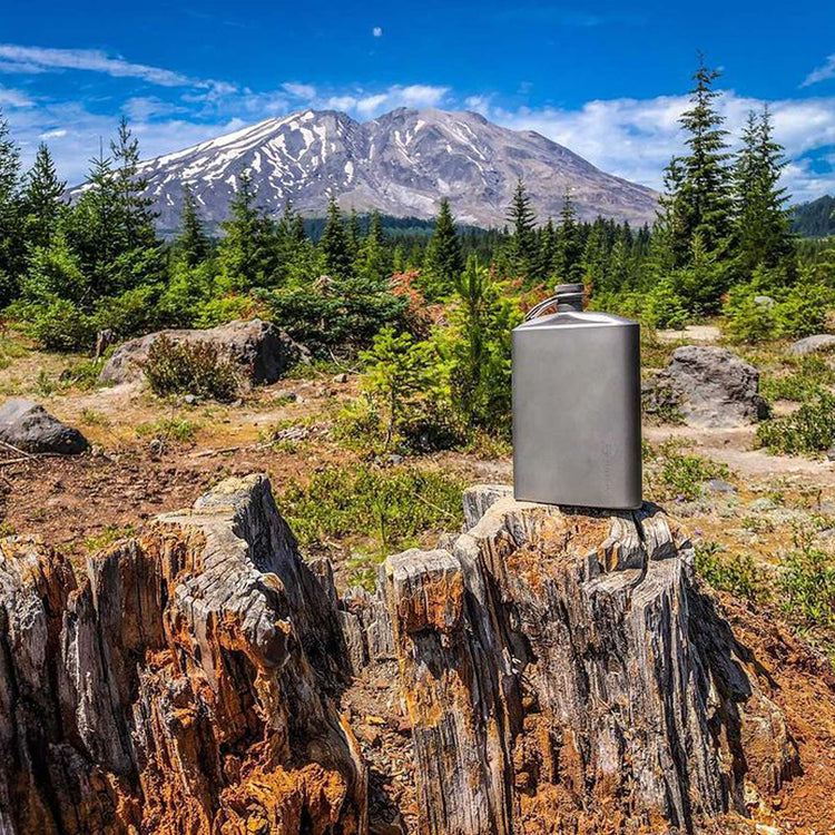 
                  
                    SilverAnt Ultralight Titanium Hip Flask and Funnel 248ml/8.73 fl oz (actual product photo, real-life use, lifestyle shoot, mountain view in background)
                  
                