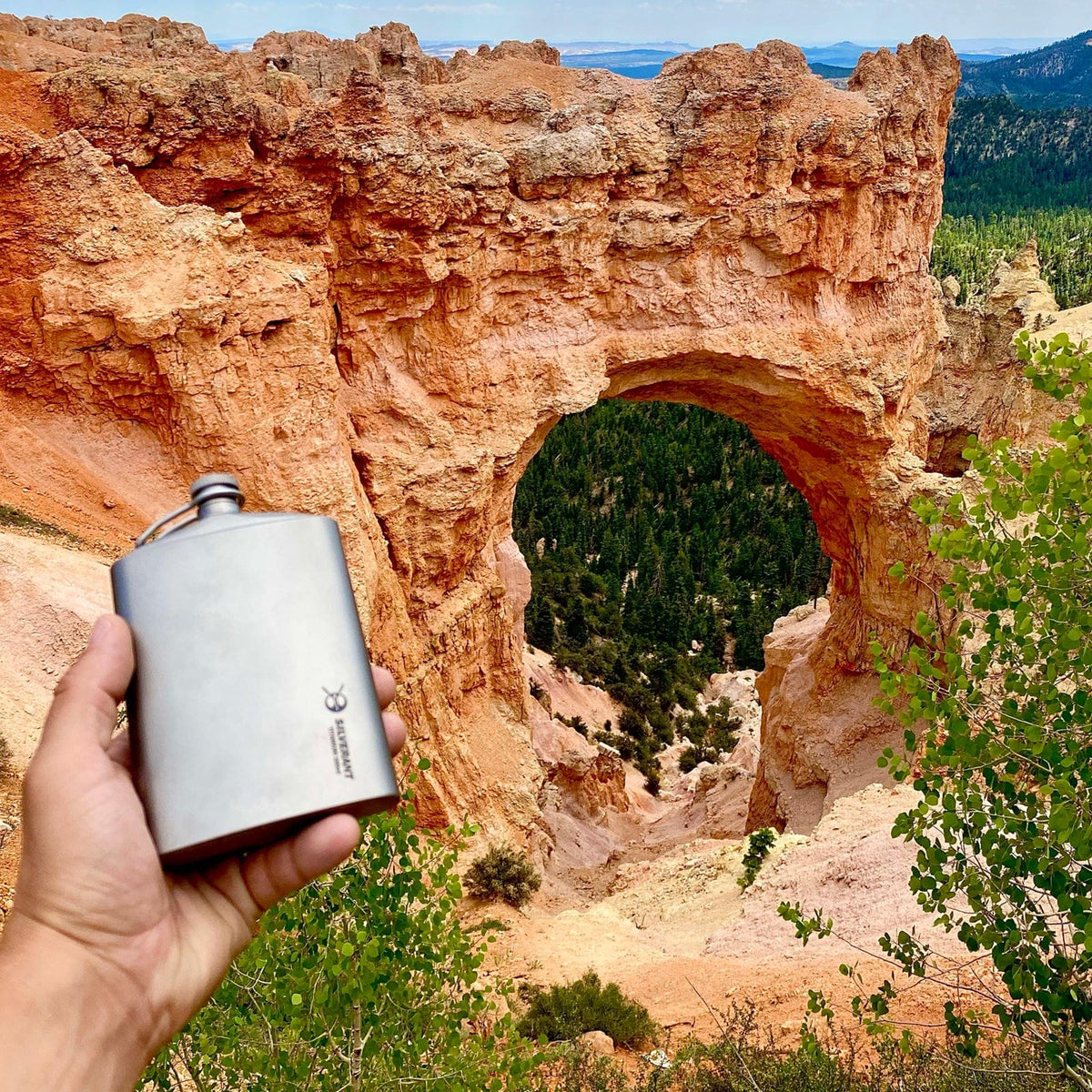 SilverAnt Ultralight Titanium Hip Flask and Funnel 248ml/8.73 fl oz Sandblasted (actual product photo, on-hand, beautiful view in background, real-life use)
