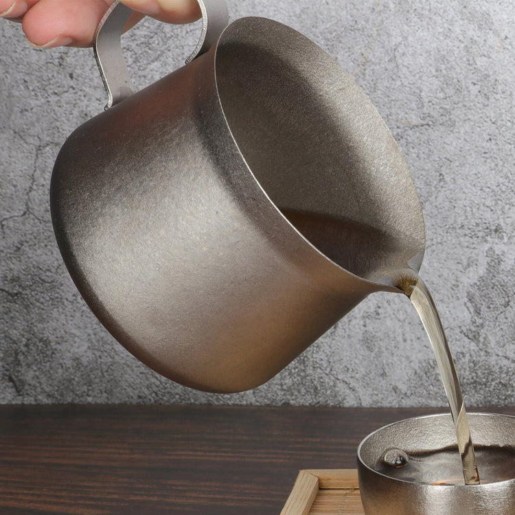 
                  
                    SilverAnt Ultralight Titanium Pour Over Tea Pot 260ml/9.15fl oz Crystallized (Actual product photo, pouring tea onto cup, real life, in use, lifestyle photo)
                  
                