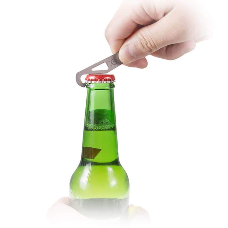 
                  
                    SilverAnt Ultralight Titanium Spork with Bottle Opener - being used to open a bottle
                  
                