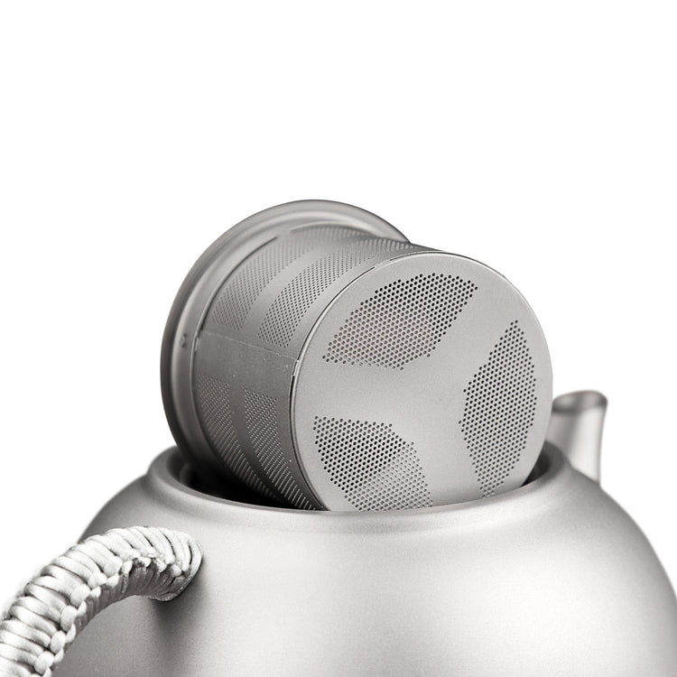 
                  
                    SilverAnt Ultralight Titanium Teapot & Traditional Tea Set - close-up of tea filter on top of tea pot
                  
                