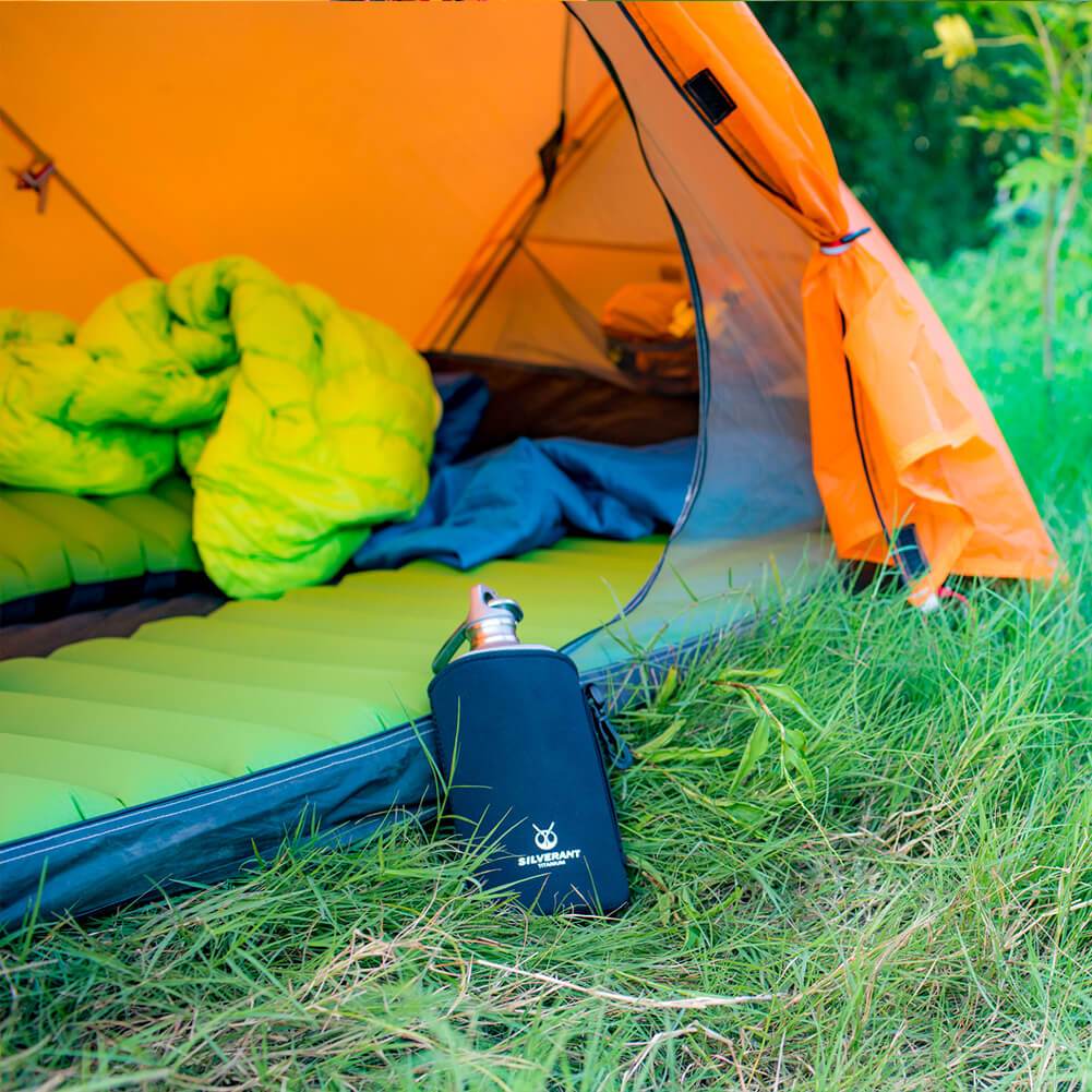 SilverAnt Ultralight Titanium Water Bottle 800ml/28.16 fl oz (Slim Sandblasted) - In-Use (lifestyle photo, camping, real photo, laid down on the ground with black thermal sleeve)