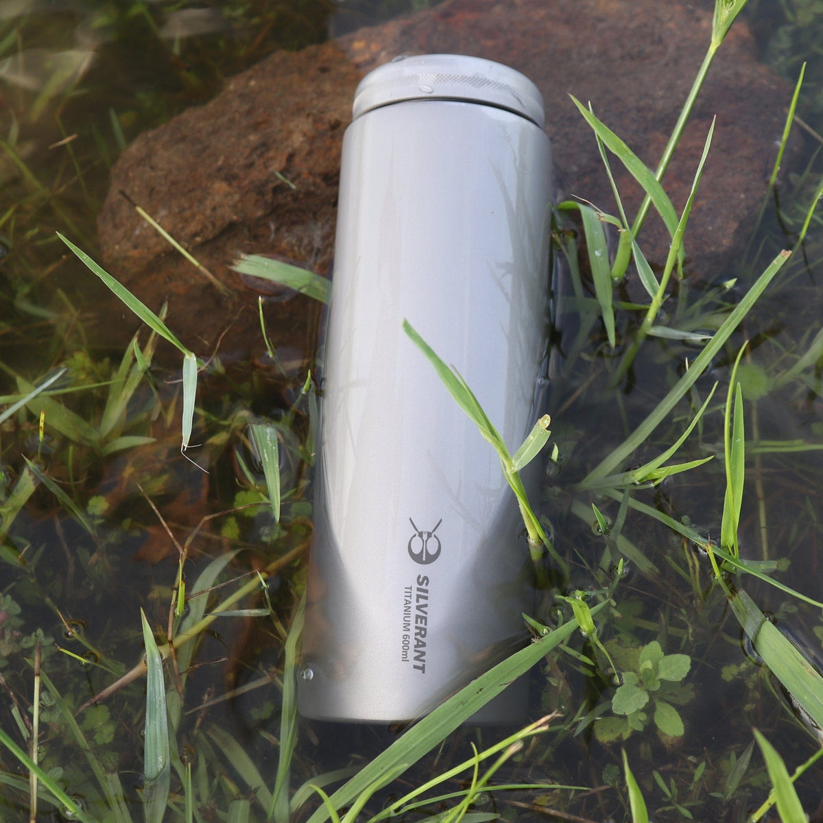 SilverAnt Ultralight Titanium Water Bottle Wide Mouth Screw Top - 600ml/21.1 fl oz (actual product photo, lifestyle shot)
