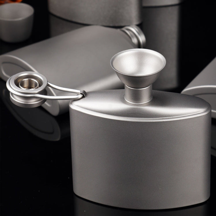 
                  
                    Titanium Hip Flask Funnel actual photo on a hip flask
                  
                